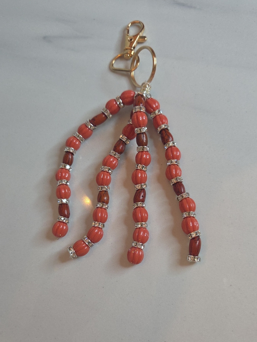 Gold-Tone Coral Beaded Tassel Bag Charm